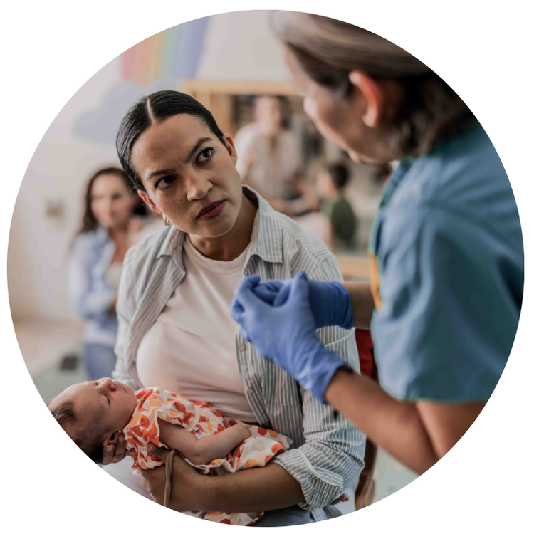 nurse with patient and baby